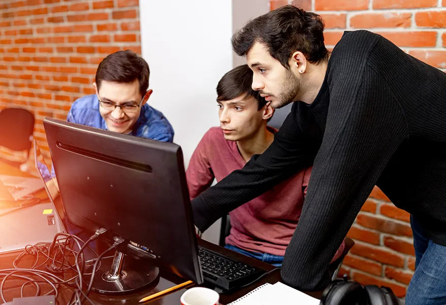 Team working together on a computer